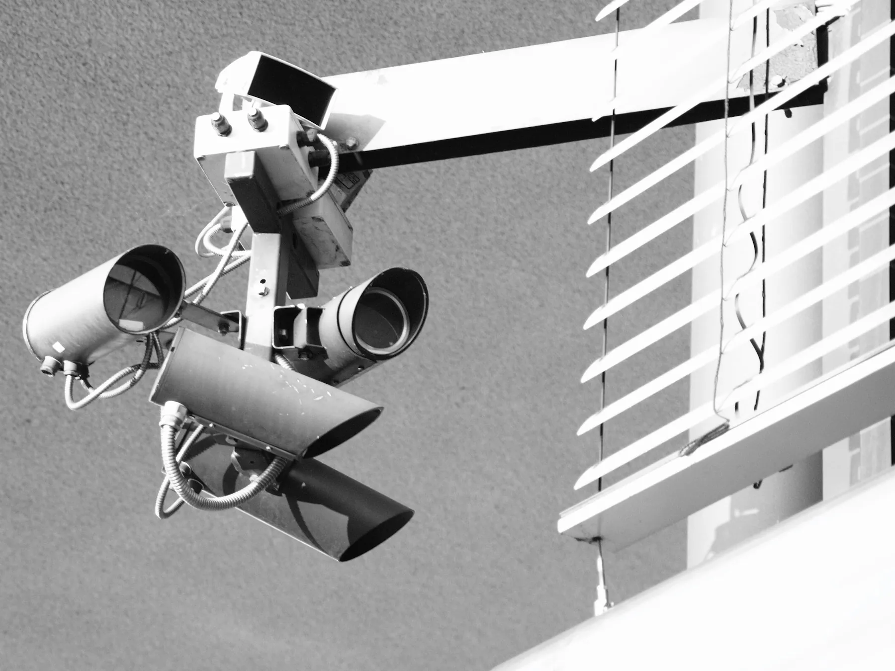 Surveillance cameras installed on a building exterior